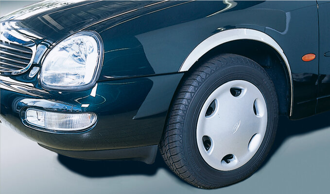 Radlaufleisten Satz Hochglanz-Edelstahl für Ford Scorpio+Tu. Radlaufleisten Satz Hochglanz-Edelstahl für Ford Scorpio+Tu.